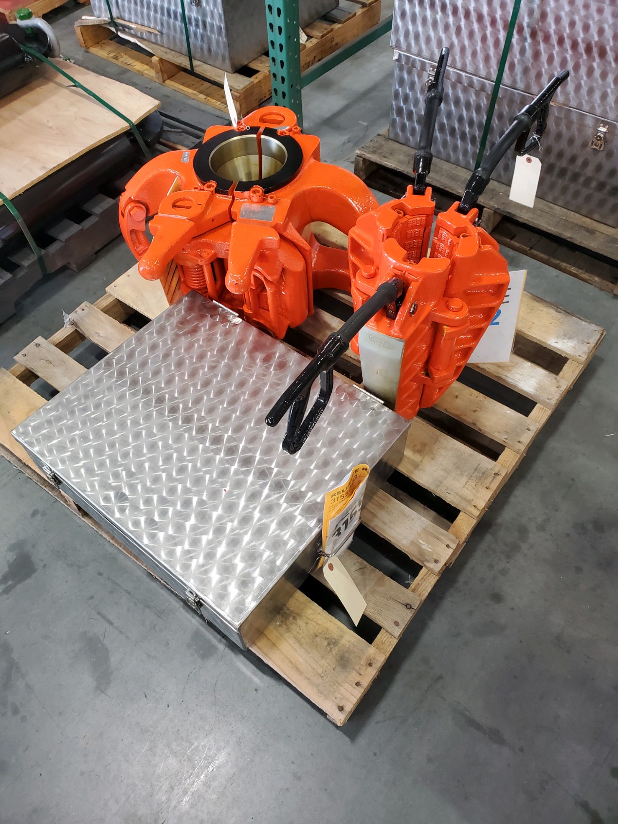 Orange handling equipment on pallet ready for rental